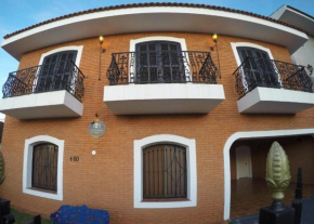 Extensão Black - Ipê Rosa Hotel